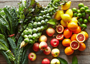 a group of fruits and vegetables on a wood surface Healthy Weight Loss Diets Rowley Regis
