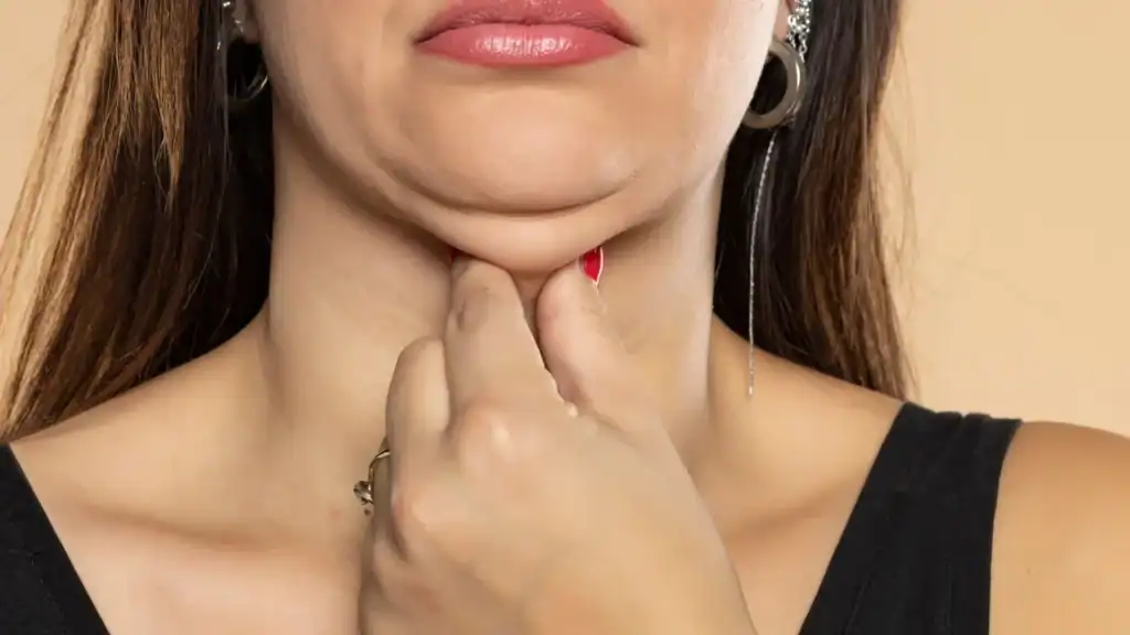 An image of a woman with double chin, sad, worried : Non Surgical Double Chin Removal Treatment in Rowley Regis, UK